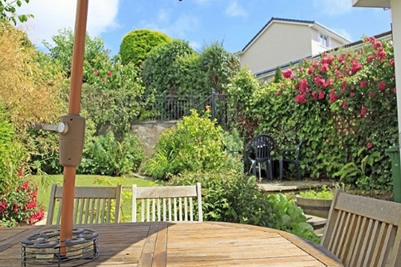 Rear garden patio and blooms